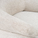 Butaca giratoria NEVADA con reposapiés y respaldo alto, en beige, detalle del tapizado