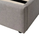 Detalle del lateral tapizado de la cama canapé OLMO en gris