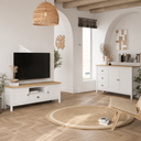 Mueble TV MUSGO de 158 cm con 2 puertas, 1 cajón y 1 hueco, en blanco, en un salón con la televisión encima