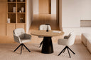 Silla SILVI Giratoria 360º con Brazos, en negra, en un comedor