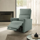 Sillón relax SOUL con posición cardio y doble reposapiés, en verde agua, abierto en un salón junto a la chimenea