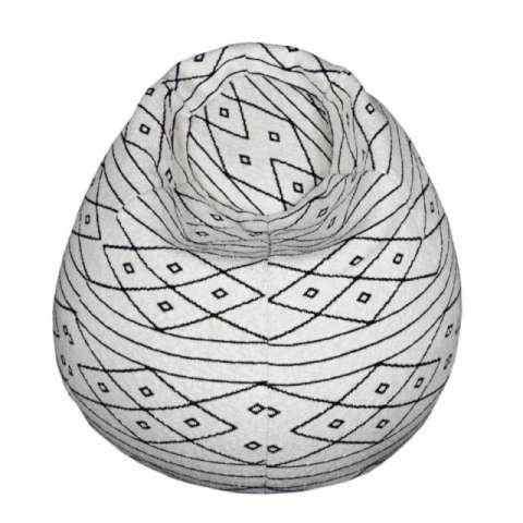 Sillón puf Cocoon blanco con motivos geométricos de diamantes negros, vista superior.
